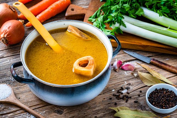 Hot and spicy roasted Beef bone broth in a bowl